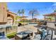 Inviting backyard with a pool, spa, outdoor seating, and lush landscaping at 721 W Mountain Sky Ave, Phoenix, AZ 85045