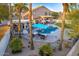 Landscaped backyard with pool, bar area, lounge chairs, and mature trees for privacy at 721 W Mountain Sky Ave, Phoenix, AZ 85045