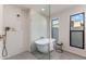 Spa-like bathroom featuring a freestanding tub, frameless glass shower, and modern fixtures at 7520 E Valley View Rd, Scottsdale, AZ 85250