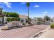 Gated community entrance with manicured landscaping and a security gate at 7520 E Valley View Rd, Scottsdale, AZ 85250