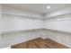 Spacious walk-in closet with built-in shelving providing ample storage at 7520 E Valley View Rd, Scottsdale, AZ 85250