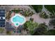 Aerial view of a community pool and park with lush landscaping and walking trails at 7807 E Granada Rd, Scottsdale, AZ 85257