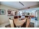 Dining area showcasing modern lighting, comfortable seating, and seamless flow to other living spaces at 7807 E Granada Rd, Scottsdale, AZ 85257