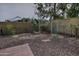 Relaxing backyard with decorative fencing and chairs to enjoy outdoor living at 815 E Paradise Ln, Phoenix, AZ 85022