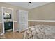 Bedroom with walk-in closet and an en suite bath at 815 E Paradise Ln, Phoenix, AZ 85022