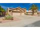 Single-Gathering home with a three-car garage and desert landscaping at 8402 W Laurel Ln, Peoria, AZ 85345