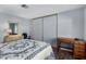 Bedroom with wooden floors and closet at 9333 E University Dr # 113, Mesa, AZ 85207