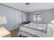 Cozy bedroom with a sliding door closet and natural light at 9333 E University Dr # 113, Mesa, AZ 85207