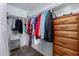 Walk-in closet featuring storage options, including shelving and drawers at 9333 E University Dr # 113, Mesa, AZ 85207