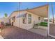 Charming home exterior featuring a covered patio and desert landscaping for low maintenance at 9333 E University Dr # 113, Mesa, AZ 85207