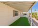 Exterior walkway and patio covered with artificial turf at 9333 E University Dr # 113, Mesa, AZ 85207