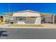 Charming single-story home with a covered front patio and carport, showcasing a cozy and inviting exterior at 9333 E University Dr # 113, Mesa, AZ 85207