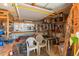 Organized garage space featuring shelving, tools, and ample storage solutions, perfect for DIY enthusiasts at 9333 E University Dr # 113, Mesa, AZ 85207