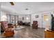 Living room featuring hardwood floors, neutral color scheme and comfortable seating at 9333 E University Dr # 113, Mesa, AZ 85207