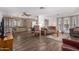 Open floor plan living area featuring hardwood floors, neutral color scheme and comfortable seating at 9333 E University Dr # 113, Mesa, AZ 85207