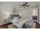 Cozy bedroom with carpeted floors and view of side bathroom at 9442 N 118Th St, Scottsdale, AZ 85259
