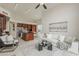 Bright open concept living room with kitchen and eat in kitchen area at 9442 N 118Th St, Scottsdale, AZ 85259