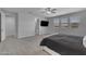 The bright primary bedroom offers lots of natural light and access to ensuite bathroom at 9942 E Rotation Dr, Mesa, AZ 85212
