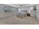 Spacious main bedroom featuring large windows and neutral carpet at 9942 E Rotation Dr, Mesa, AZ 85212