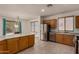 Spacious kitchen with stainless steel appliances, lots of cabinets, and a view of the dining area, perfect for entertaining at 1101 S Hazel St, Gilbert, AZ 85296