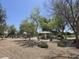 A neighborhood park that features picnic tables, a shaded gazebo, mature trees, and a playground for hours of fun at 1101 S Hazel St, Gilbert, AZ 85296