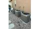 Three York air conditioning units are installed next to the home on a bed of rock at 40201 N Hickok Trl, Anthem, AZ 85086