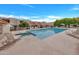 Community pool and lounge area with chairs and landscaped surroundings offering a relaxing retreat at 509 E Ironwood Dr, Phoenix, AZ 85020