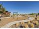 Community playground with modern equipment, swings, and shaded areas, perfect for to play and socialize at 10134 E Supernova Dr, Mesa, AZ 85212