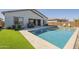 Stunning pool and patio area, great for outdoor relaxation and entertaining, complemented by well-maintained landscaping at 10134 E Supernova Dr, Mesa, AZ 85212