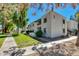 Well-maintained apartment building with lush landscaping and sidewalks on a sunny day at 10444 N 69Th St # 224, Paradise Valley, AZ 85253