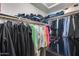 Walk-in closet with lots of hanging clothes and shelf space at 11502 E Rafael Ave, Mesa, AZ 85212