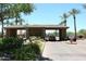 Gated community entrance with lush landscaping and security features at 11645 E Bella Vista Dr, Scottsdale, AZ 85259
