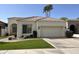 Charming single-story home with a two-car garage, desert landscaping, and a red tile roof at 11645 E Bella Vista Dr, Scottsdale, AZ 85259