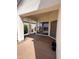 Covered patio area with sliding glass doors offering seamless indoor-outdoor living at 11645 E Bella Vista Dr, Scottsdale, AZ 85259