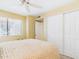 Bedroom showcasing a bed, ceiling fan, and ample closet space at 11837 N 40Th Pl, Phoenix, AZ 85028