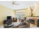 Bright living room with a fireplace, comfortable seating, and large windows for natural light at 11837 N 40Th Pl, Phoenix, AZ 85028