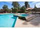 Inviting pool and spa area with comfortable seating and resort-style amenities at 11837 N 40Th Pl, Phoenix, AZ 85028