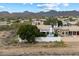 Spacious single-Gathering home with mountain views and a backyard pool in a desert landscape at 12055 E Clinton St, Scottsdale, AZ 85259