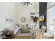 Bright living room with high ceilings, a modern fireplace, and comfortable seating at 12055 E Clinton St, Scottsdale, AZ 85259