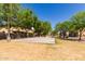 Outdoor basketball court with well-kept landscaping is ready for a pickup game! at 1330 S Aaron -- # 218, Mesa, AZ 85209