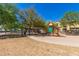 Community playground includes a play area and a gazebo with benches for gathering at 1330 S Aaron -- # 218, Mesa, AZ 85209