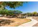 Neighborhood playground with covered picnic tables, slide, and other play equipment at 1330 S Aaron -- # 218, Mesa, AZ 85209
