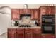 Close up of a kitchen with black gas stovetop and stainless steel appliances at 13514 W Banff Ln, Surprise, AZ 85379