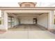 Spacious, two-car garage with ample storage space and convenient access to the home at 1439 S Dodge St, Gilbert, AZ 85233