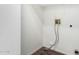 Bright, white laundry room with hardwood flooring and standard hookups at 1439 S Dodge St, Gilbert, AZ 85233