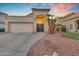 Charming single-story home with desert landscaping, 2-car garage and covered front porch at 15206 S 47Th St, Phoenix, AZ 85044