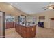 Spacious kitchen features a center island, stainless appliances, and access to the backyard at 15206 S 47Th St, Phoenix, AZ 85044