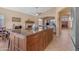 Kitchen with a large center island and an open floorplan to the living spaces at 15206 S 47Th St, Phoenix, AZ 85044