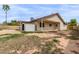View of backyard featuring covered patios, shed, and ample space at 16010 N 47Th Dr, Glendale, AZ 85306