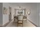 Dining room with hardwood floors, ceiling fan, and table set for dinner is ready at 16010 N 47Th Dr, Glendale, AZ 85306